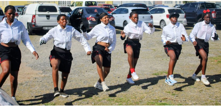 Young dancers from Dream Chasers performing outdoors in our community